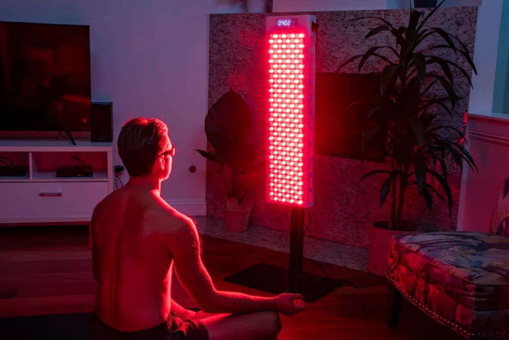 sitting in front of redlight panel