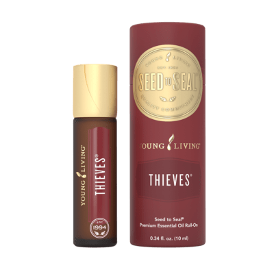 thieves roll on bottle next to case