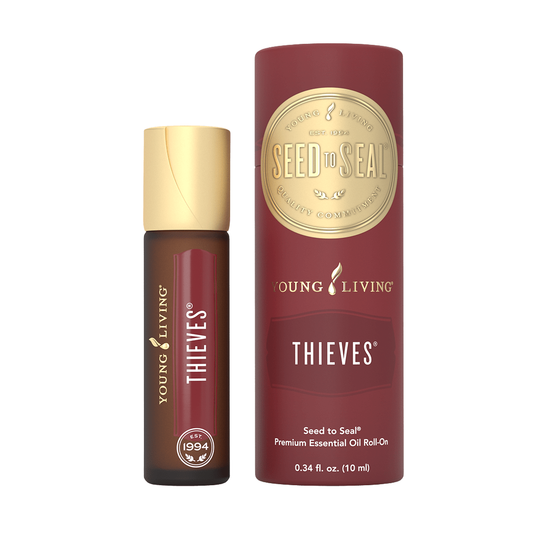 thieves roll on bottle next to case